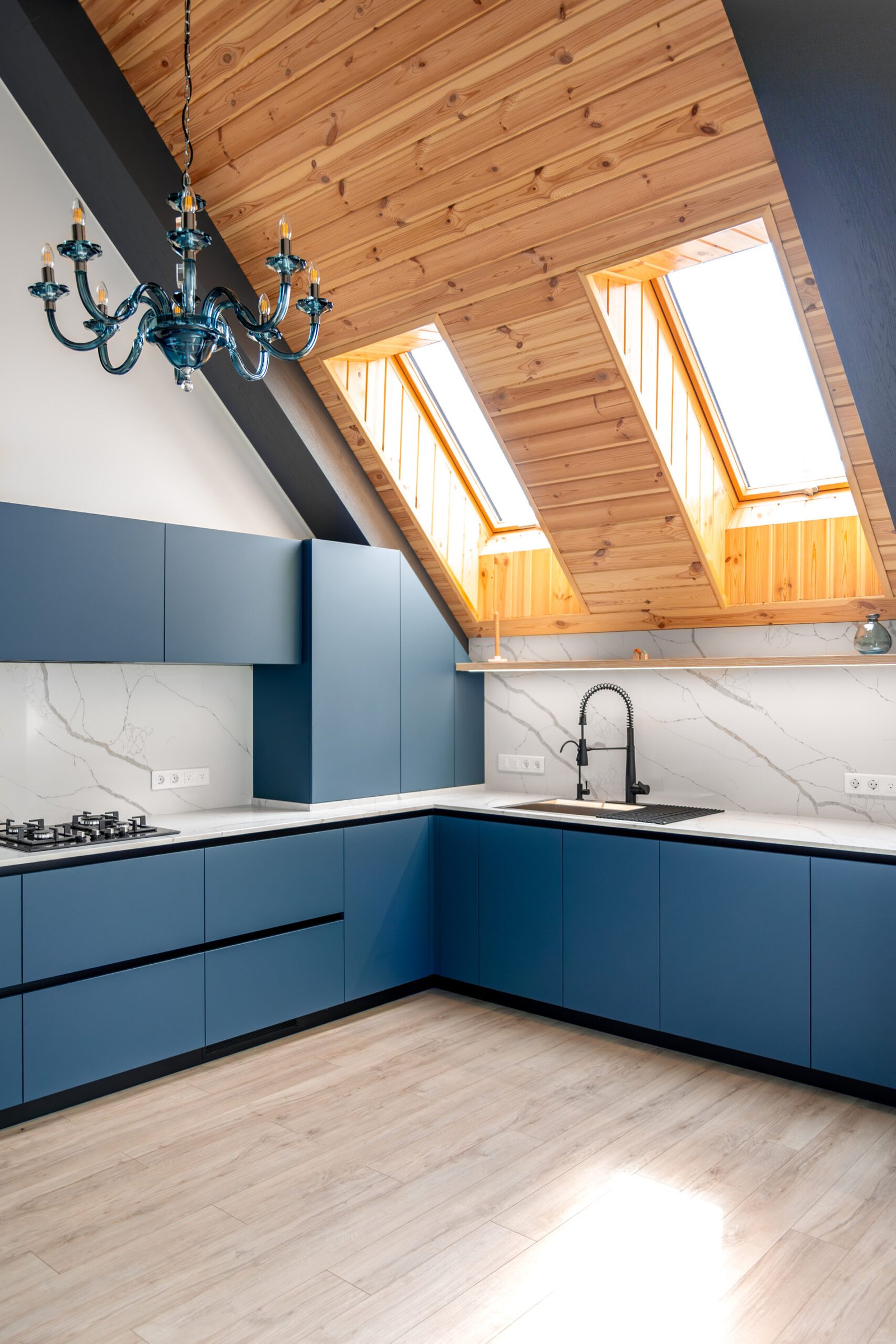 Attic kitchen blue cabinets | Apex Garage