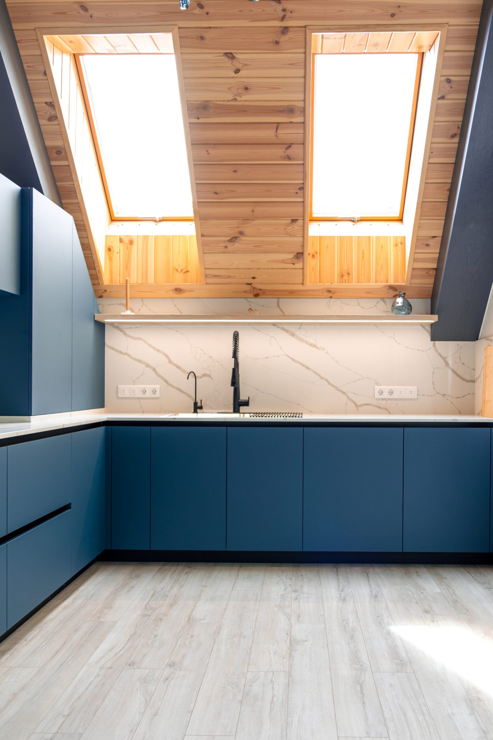 Blue kitchen attic skylights | Apex Garage