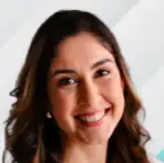 Smiling woman with dark hair | Apex Garage Conversions