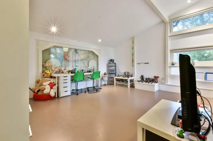 large-childrens-room-with-rich-interior_305343-21112.webp