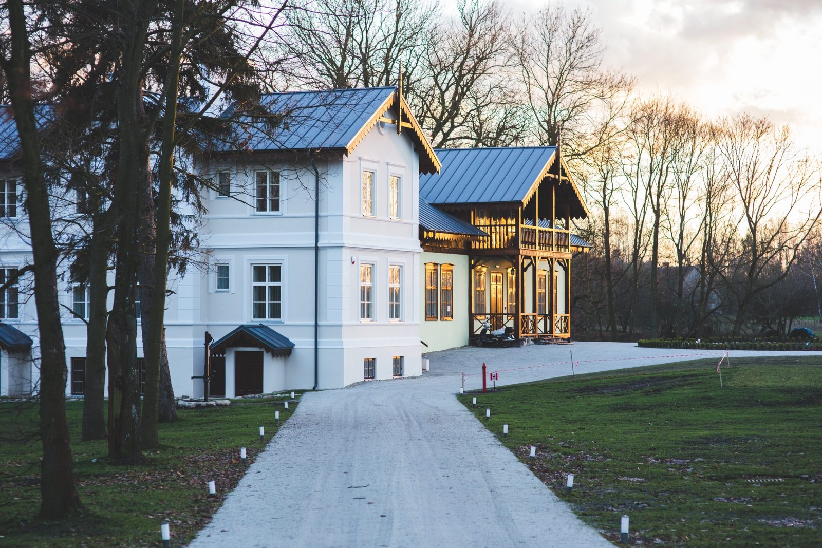 White historic mansion villa | Apex Garage